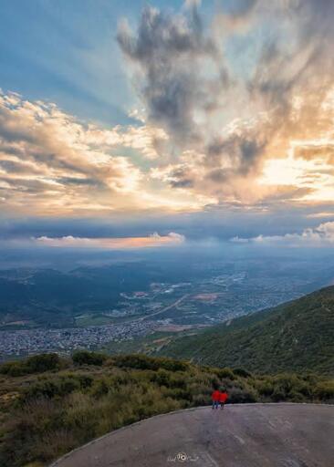 ​From the summit of Mount Haidar in Beit Jann, located in Upper Galilee, Palestine—the breathtaking landscape of my homeland holds your gaze so deeply, your eyes can never leave the land.